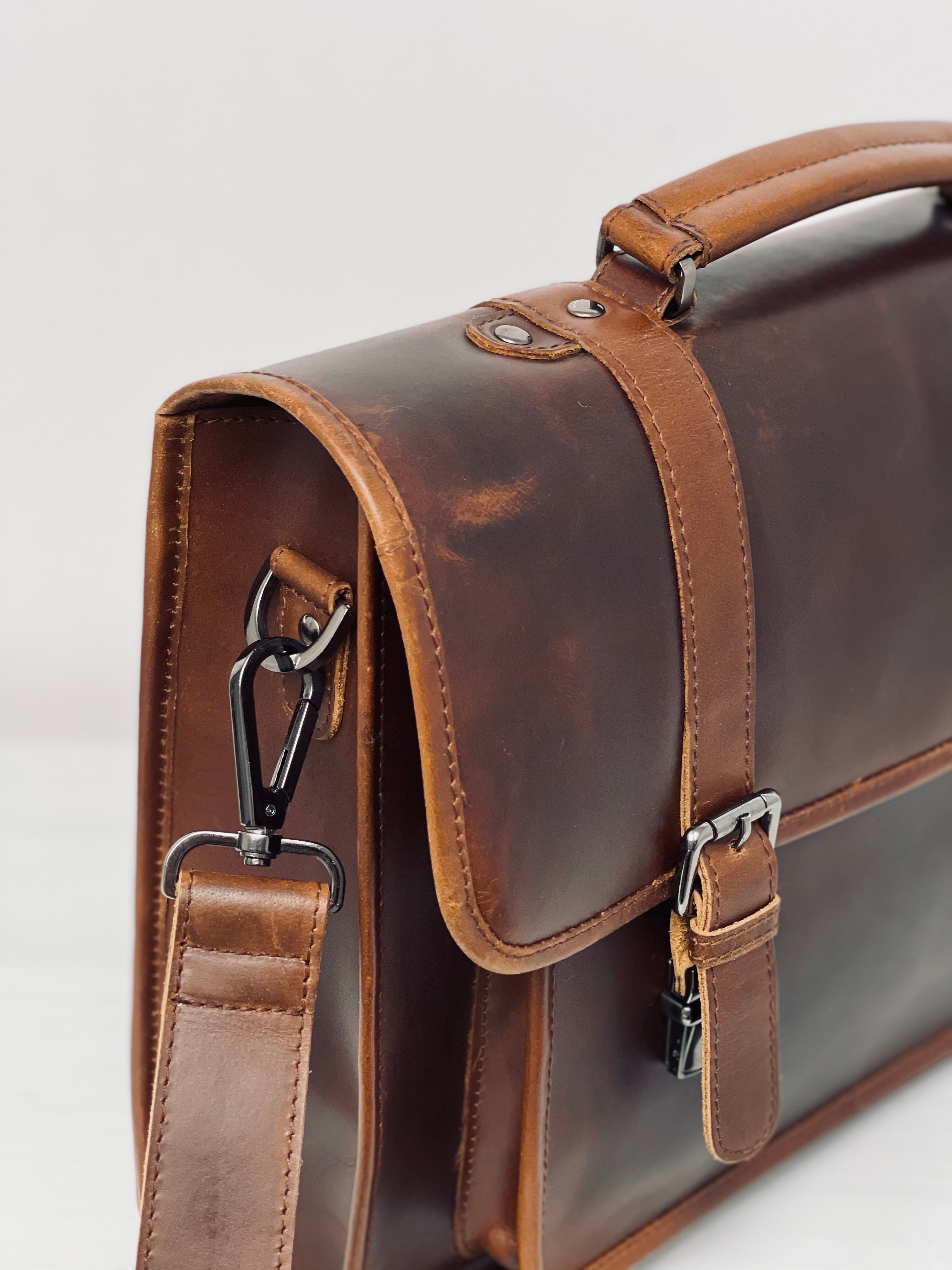 Classic leather satchel in vintage style with laptop compartment